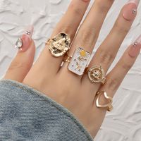 Ig Style Elegant Geometric Alloy Stone Plating Inlay Artificial Gemstones Gold Plated Women's Rings main image 1
