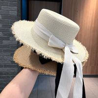 Women's Sweet Pastoral Solid Color Bowknot Wide Eaves Straw Hat main image 1