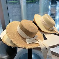 Women's Sweet Pastoral Solid Color Bowknot Wide Eaves Straw Hat main image 3