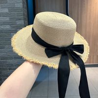 Women's Sweet Pastoral Solid Color Bowknot Wide Eaves Straw Hat sku image 1