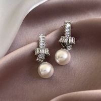 1 Pair Simple Style Commute Solid Color Plating Inlay Imitation Pearl Alloy Zircon White Gold Plated Drop Earrings main image 1