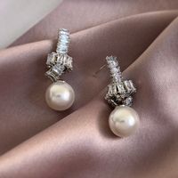 1 Pair Simple Style Commute Solid Color Plating Inlay Imitation Pearl Alloy Zircon White Gold Plated Drop Earrings main image 3