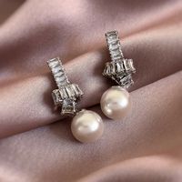 1 Pair Simple Style Commute Solid Color Plating Inlay Imitation Pearl Alloy Zircon White Gold Plated Drop Earrings main image 5
