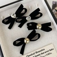 Women's Simple Style Commute Bow Knot Cloth Inlay Pearl Hair Clip main image 2