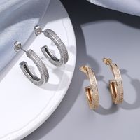 1 Pair Hip-Hop Rock Simple Style C Shape Polishing Inlay Copper Zircon 18K Gold Plated Ear Studs main image 1