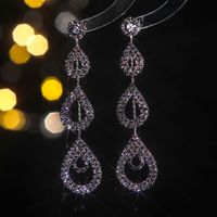 Glam Shiny Water Droplets Rhinestone Plating Hollow Out Inlay Rhinestones Silver Plated Women's Drop Earrings main image 6