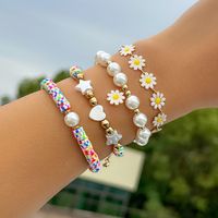 Vacation Beach Pastoral Star Heart Shape Flower Imitation Pearl Alloy Soft Clay Beaded Plating Women's Bracelets main image 3