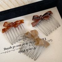 Women's Vintage Style Bow Knot Alloy Acetic Acid Sheets Insert Comb main image 3