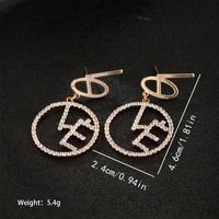 1 Paire Xuping Style Moderne Lettre Placage Incruster Alliage Pierres Précieuses Artificielles Plaqué Or 18k Boucles D'oreilles main image 2