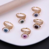 Simple Style Commute Devil's Eye Arylic Copper Plating Hollow Out Inlay Acrylic Zircon 18k Gold Plated Unisex Open Rings main image 1