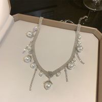 Elegant Solid Color Copper Alloy Plating Inlay Artificial Pearls Zircon White Gold Plated Women's Necklace main image 4