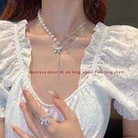 Mode Forme De Cœur Fleur Noeud D'arc Perle Artificielle Alliage Perle Placage Incruster Strass Femmes Pendentif Collier sku image 10