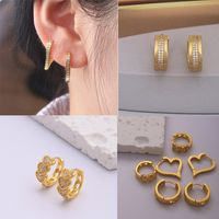 1 Par Elegante Romántico Vistoso Estrella Forma De Corazón Enchapado Ahuecar Embutido Metal Cobre Circón Chapado En Oro De 18 Quilates. Pendientes De Aro main image 1