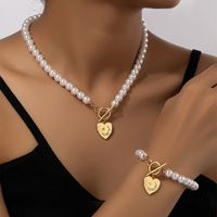 Elegante Glamour Señora Forma De Corazón Arílico Perla De Imitación Aleación Enchapado Chapado En Oro De 14 Quilates. Mujeres Pulsera Collar main image 5