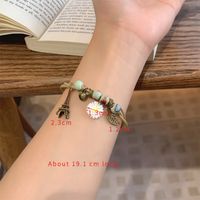 Casual Simple Style Four Leaf Clover Butterfly Daisy Baroque Pearls Ceramics Beaded Plating Braid White Gold Plated Women's Bracelets sku image 1