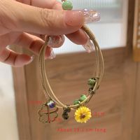 Casual Simple Style Four Leaf Clover Butterfly Daisy Baroque Pearls Ceramics Beaded Plating Braid White Gold Plated Women's Bracelets sku image 3