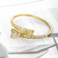 Xuping Shiny Bow Knot Alloy Plating Inlay Artificial Gemstones 14k Gold Plated Women's Bangle main image 4