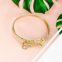 Xuping Shiny Bow Knot Alloy Plating Inlay Artificial Gemstones 14k Gold Plated Women's Bangle main image 5