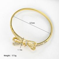 Xuping Shiny Bow Knot Alloy Plating Inlay Artificial Gemstones 14k Gold Plated Women's Bangle sku image 1
