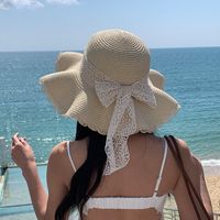 Women's Elegant Cute Pastoral Solid Color Bowknot Big Eaves Sun Hat main image 1