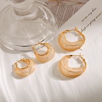 1 Pair Elegant Geometric Solid Color Plating Mesh Hollow Out Copper Hoop Earrings main image 7