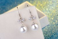 1 Pair Elegant Bow Knot Plating Inlay Copper Artificial Pearls Zircon White Gold Plated Drop Earrings main image 4
