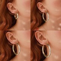1 Pair Vintage Style Simple Style Classic Style Round Plating Hollow Out Copper 14k Gold Plated Hoop Earrings main image 1