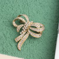 Elegant Bow Knot Alloy Inlay Crystal Rhinestones Women's Brooches main image 4