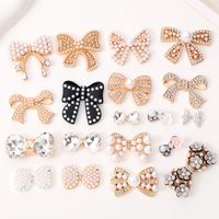 Sweet Bow Knot Metal Plating Inlay Artificial Pearls Artificial Diamond Jewelry Accessories main image 1