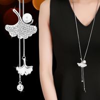 Elegant Ginkgo Leaf Alloy Inlay Artificial Pearls Glass Women's Sweater Chain main image 1