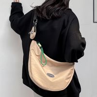 Unisex Nylon Solid Color Preppy Style Vacation Sewing Thread Dumpling Shape Zipper Shoulder Bag main image 5