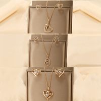 Lady Xuping Commute Cross Circle Heart Shape Alloy Plating Inlay Artificial Gemstones 18k Gold Plated Women's Earrings Necklace main image 1
