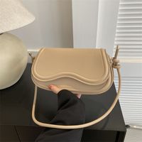 Women's Pu Leather Solid Color Streetwear Oval Flip Cover Shoulder Bag main image 2
