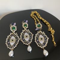 Retro Baroque Style Eye Alloy Pearl Plating Inlay Acrylic Rhinestones Gold Plated Women's Earrings Necklace main image 4