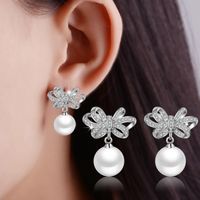 1 Pair Cute Sweet Bow Knot Plating Inlay Copper Pearl Zircon White Gold Plated Drop Earrings main image 1