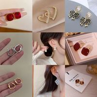 1 Pair Simple Style Square Heart Shape Bow Knot Enamel Plating Inlay Alloy Artificial Gemstones Artificial Pearls Rhinestones 14k Gold Plated Drop Earrings Ear Studs main image 1