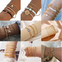 Simple Style Streetwear Round Heart Shape Solid Color Alloy Iron Copper Beaded Plating Inlay Rhinestones Zircon Women's Bracelets main image 1