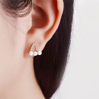 1 Pair IG Style Simple Style Triangle Hollow Out Inlay Copper Artificial Pearls Zircon Ear Studs main image 3