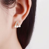 1 Pair IG Style Simple Style Triangle Hollow Out Inlay Copper Artificial Pearls Zircon Ear Studs main image 4