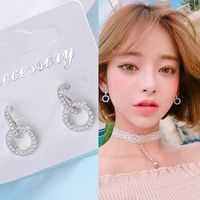 1 Pair Simple Style Circle Hollow Out Inlay Copper Zircon Drop Earrings main image 1