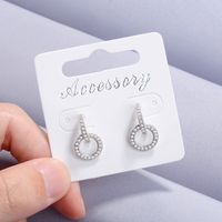 1 Pair Simple Style Circle Hollow Out Inlay Copper Zircon Drop Earrings main image 3