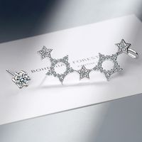 1 Pair Simple Style Shiny Star Asymmetrical Hollow Out Inlay Copper Zircon Ear Studs main image 5