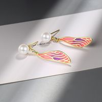1 Pair Simple Style Classic Style Wings Plating Inlay Copper Rhinestones Pearl Drop Earrings main image 4