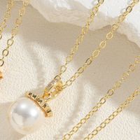 Elegant Vacation Simple Style Star Crown Bow Knot Copper 14k Gold Plated White Gold Plated Artificial Pearls Zircon Pendant Necklace In Bulk main image 5