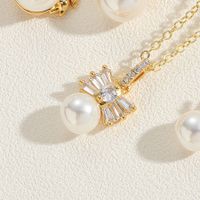 Elegant Vacation Simple Style Star Crown Bow Knot Copper 14k Gold Plated White Gold Plated Artificial Pearls Zircon Pendant Necklace In Bulk main image 6
