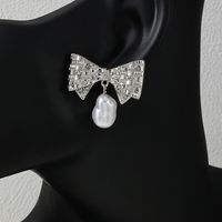 1 Pair Glam Bow Knot Plating Inlay Alloy Artificial Pearls Rhinestones Drop Earrings main image 3