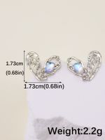 1 Pair Simple Style Star Heart Shape Bow Knot Plating Inlay Alloy Rhinestone Acrylic Gem Resin White Gold Plated Earrings main image 6