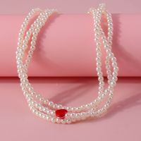 Simple Style Classic Style Heart Shape Artificial Pearl Zinc Alloy Beaded Women's Layered Necklaces main image 6