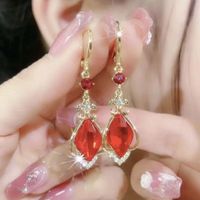 1 Pair Glam Pastoral Simple Style Quadrilateral Rhombus Inlay Alloy Artificial Gemstones Gold Plated Drop Earrings main image 1