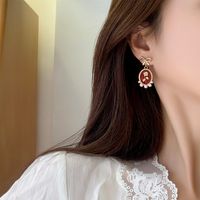 1 Pair Vintage Style Bow Knot Enamel Plating Inlay Alloy Artificial Pearls Gold Plated Drop Earrings main image 5